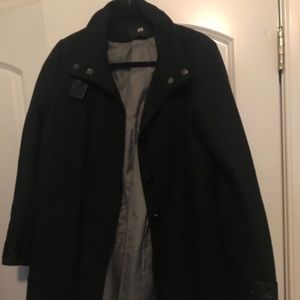 Black lighter coat with leather like sleeves